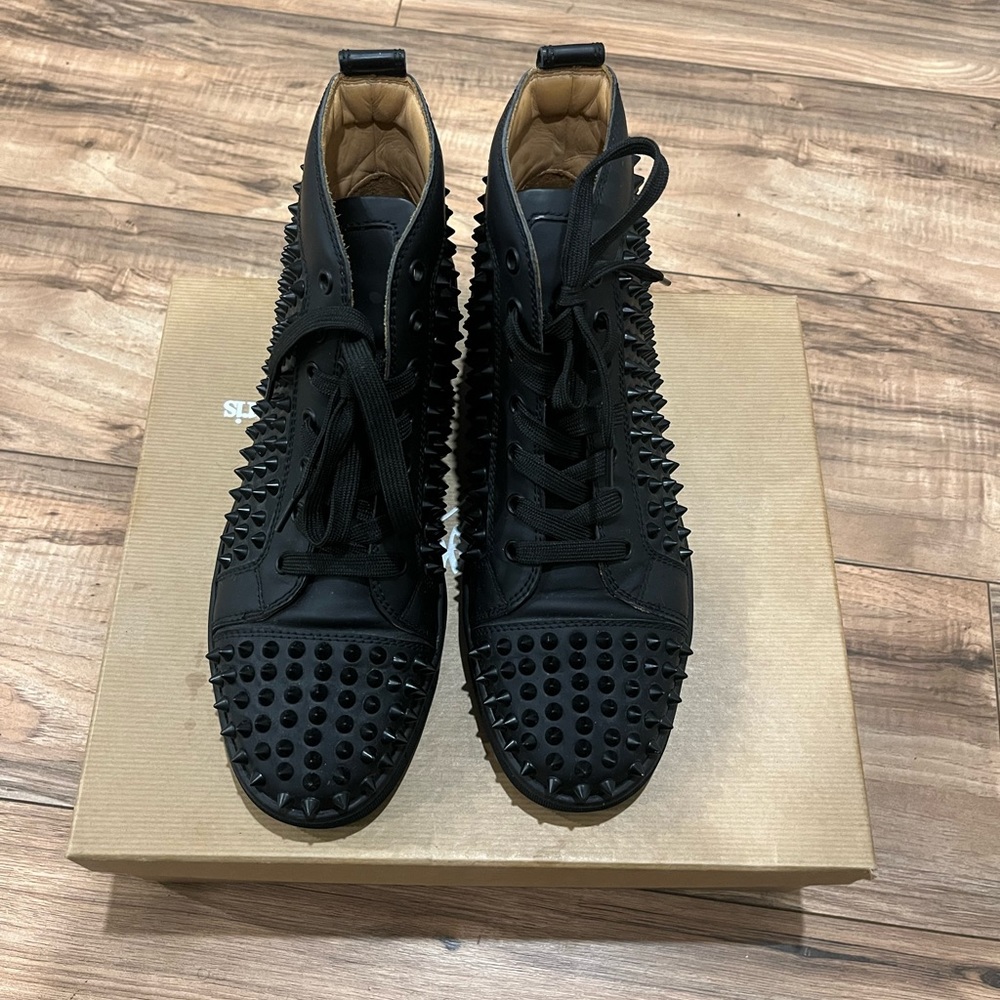 Christian Louboutin- Calf leather and spikes - Black